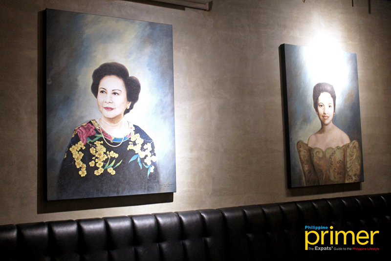 Portraits of Chef Enrique's two grandmothers displayed at Mijo Comfort Food