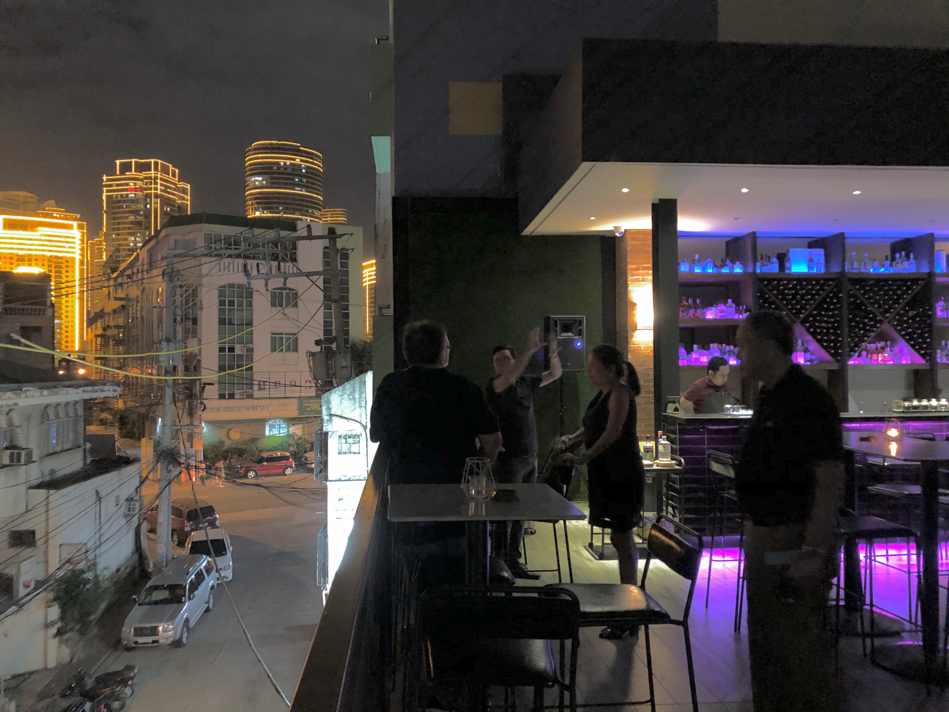 Church rooftop bar — Makati skyline view